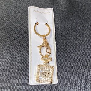 Elegant Gold Perfume Bottle Key Holder